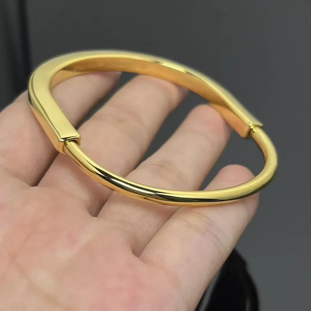 Tiffany  Co. Smooth Lock Hinged Bangle Gold-Tone product view 1