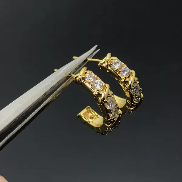 Tiffany  Co. Edge Cross Pavé-Effect Hoop Earrings Gold-Tone product photo