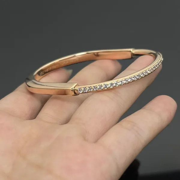 Tiffany  Co. Lock Half Pavé-Effect Hinged Bangle Rose-Tone product photo