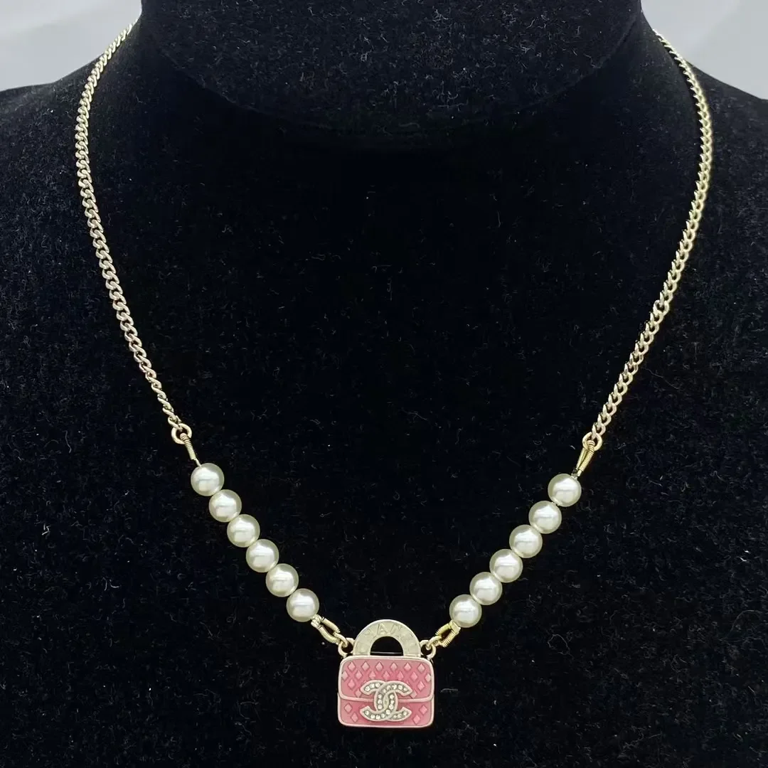 Chanel Mini Handbag Charm Pearl-Effect Necklace Pink and Gold-Tone product view 1