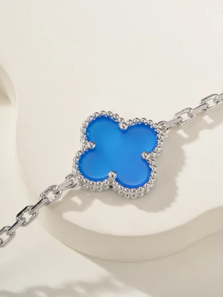 Van Cleef  Arpels Alhambra Blue Clover and Silver-Tone Knot Bracelet product view 6