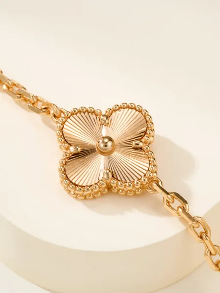 Van Cleef  Arpels Alhambra Pale Pink Clover and Gold-Tone Knot Bracelet product view 6