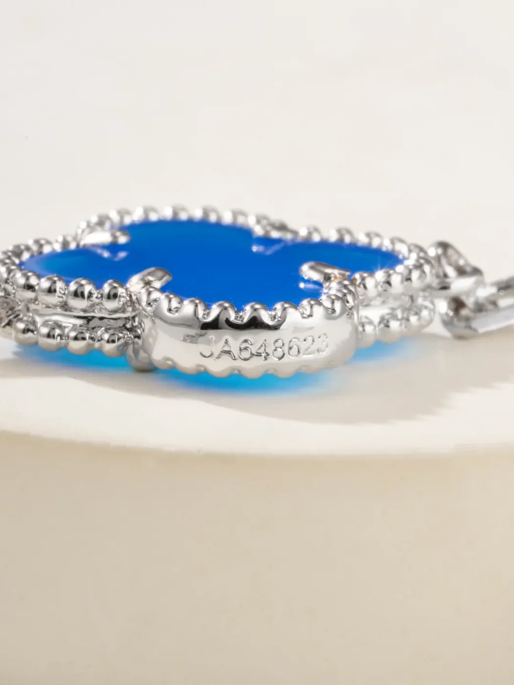 Van Cleef  Arpels Alhambra Blue Clover and Silver-Tone Knot Bracelet product view 9