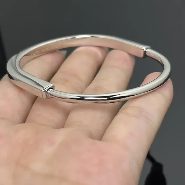 Tiffany  Co. Smooth Lock Hinged Bangle Silver-Tone product photo