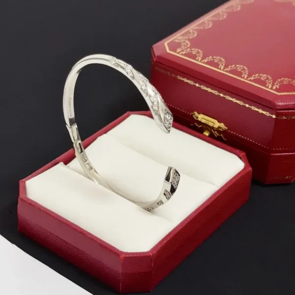Cartier Silver-Tone Crossed Open Cuff with Pave-Effect Detail product view 6