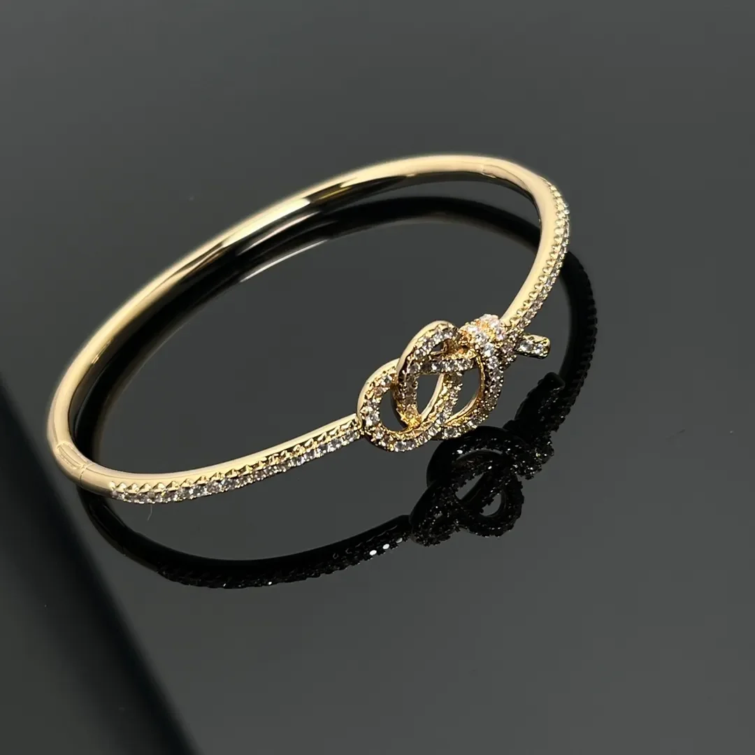 Tiffany  Co. Woven Knot Round Pavé-Effect Bangle Gold-Tone product view 1
