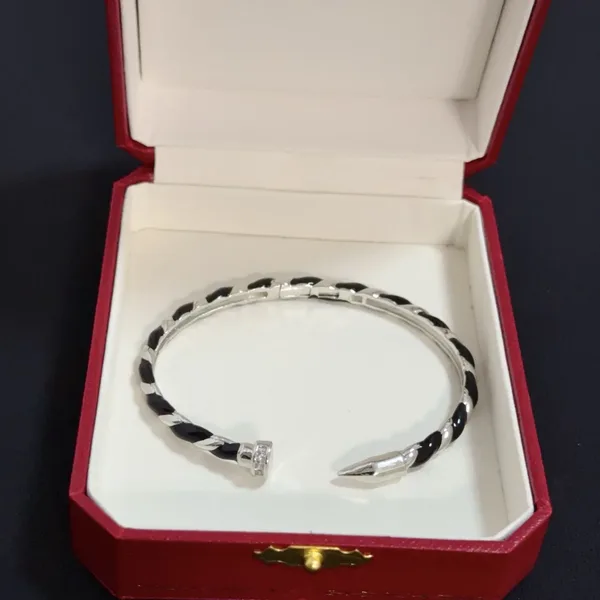 Cartier Silver-Tone Twisted Nail Cuff with Black Details product view 3