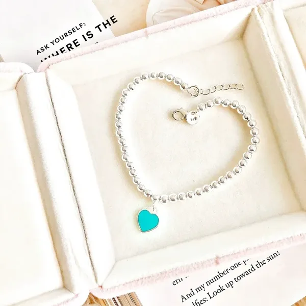 Tiffany  Co. Blue Heart Tag Bead Bracelet Silver-Tone with Blue Inlay product photo