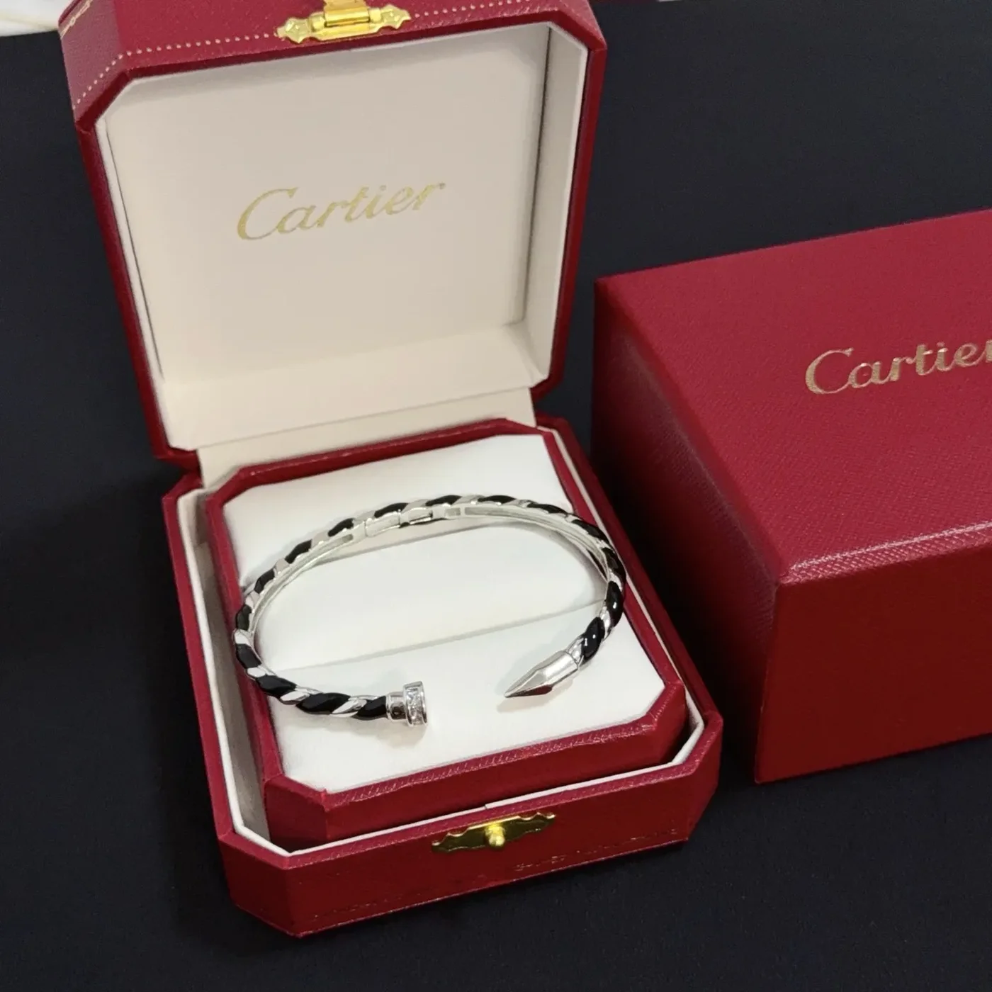 Cartier Silver-Tone Twisted Nail Cuff with Black Details product view 1
