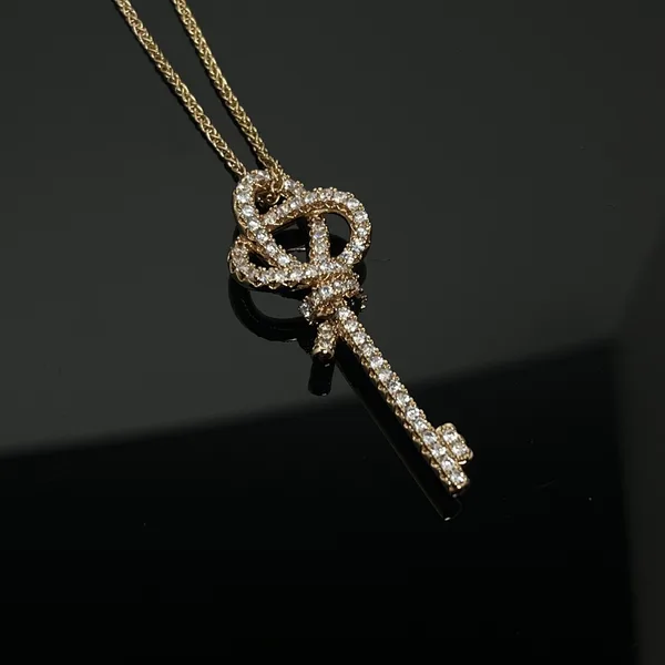 Tiffany  Co. Woven Knot Key Pavé-Effect Necklace Gold-Tone product photo